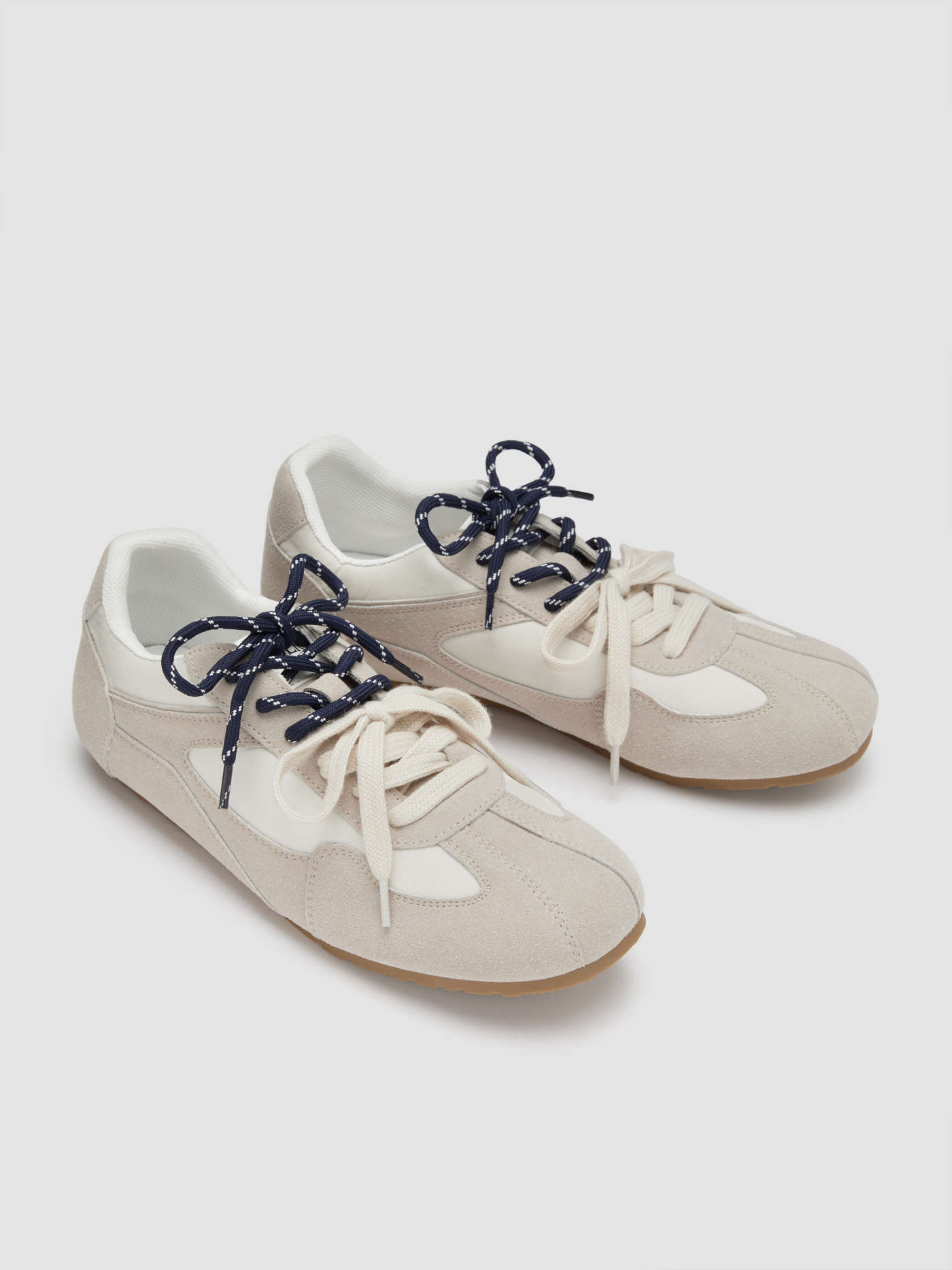 DOUBLE LACE-UP & EYE EMBROIDERED SNEAKERS